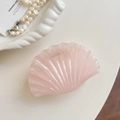 Detailed macro view of a light pink seashell hair claw clip with smooth acetate texture - 6# Pink Scallop 9.5cm
