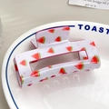 Detailed view of rectangle white hair claw clip with red watermelon patterns on a white plate - Watermelon (8cm)