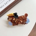 Close-up of cute cartoon dog hair claw clip made of brown marble acetate with love engraving - 8.5cm / Yellow Hat Dog (5948989790192)