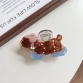 Detail view of a cute cartoon dog hair claw clip made of brown acetate with pink ear muffs - 7.5cm / Pink Hat Dog (5948989790190)
