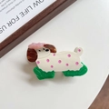 Detailed close-up of cartoon puppy hair claw with pink polka dots and floral detail - 8cm / White Spotted Dog (5948989790191)