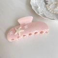 Vista detallada de una pinza para el cabello rosa con estrellas de mar y pedrería - Rosa (10cm)