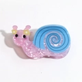 Detailed view of cute purple snail hair claw clip with blue shell and yellow flowers - Pink and Blue Snail