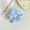 Detailed macro view of the sky blue and cream white frangipani flower hair claw clip - 8cm / White Edge Blue Flower
