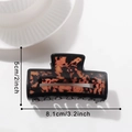 Detail view of tortoiseshell square hair claw clip with dimensions 8.1cm by 5cm - Brown Tortoise Shell (Medium)