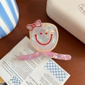 Détail d'une pince à cheveux en acrylique laser avec motif smiley et nœud rouge - 6# Visage Souriant-env. 8cm