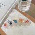 Pinza per capelli serie oceano con motivi a stella marina e conchiglia in acetato crema - L / Stile Vita Marina Crema Traslucido