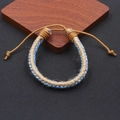 Pulsera bohemia hecha a mano con cuerda de cáñamo trenzada beige y azul ajustable - Azul (BN-0021-Azul)