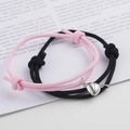 Magnetic couple bracelets set with heart-shaped charms and adjustable woven ropes - Black & Pink (BM-0009)