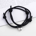 Magnetic couple heart bracelets with black braided cord and silver-tone alloy heart charms - Black (BM-0009)