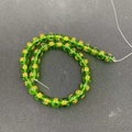 Macro shot of transparent green glass beads with gold engraved Chinese blessing characters - 10mm / Green Wealth God Style (MS-0029-绿财神)
