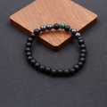 Handmade beaded anklet with matte black stones, metallic gray beads and green malachite accent - Green Peacock Stone