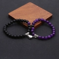 Close-up of 8mm heart magnetic couple bracelets with matte black and purple beads - Purple Matte (BNS-0564-Purple Matte)