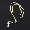 Classic 8mm wooden rosary necklace with carved cross pendant on black background - Natural Wood Color