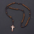 Detail of hand-woven rosary featuring 8mm wooden beads and a carved INRI crucifix pendant - Brown