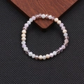 Dettaglio del bracciale elastico bohémien con perline di cristallo sfaccettate multicolore - Serie Rosa