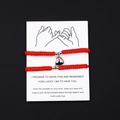 Handmade red braided couple bracelets with magnetic heart charm on white promise card - Red Rope Steel Color Magnetic Heart