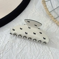 Elegante pinza per capelli in acetato crema con motivo a cagnolino Scottish Terrier nero - crema / 10cm
