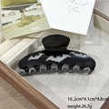 Black Halloween bat hair claw clip with silver glitter accents for stylish hair styling - Black Glitter Bat Pattern