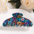 Macro view of large hair claw clip featuring vibrant multi-color floral print patterns - Style G (10.3cm)