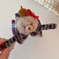 Detail of cute plush bear hair claw clip featuring a red bow and a knitted hat - 13cm / Apricot (Apricot Bear)