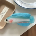Detail view of a creative fish-shaped acetate hair claw clip with a jelly texture finish - Blue Silver Dragon Fish 11cm
