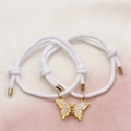 Pulseras tejidas a mano para parejas con mariposa magnética y detalles dorados - Blanco