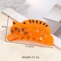 Haarklammer Katze aus Acetat in Orange mit Strasssteinen, Größe 10,5 cm lang, 4 cm hoch - Orangene Katze