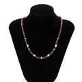 Detail view of Bohemian surfer necklace with wood beads on a black mannequin display - Silver Style (05579)