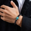 Men's black lava rock beaded bracelet with turquoise turtle charm worn on wrist - Black Lava Stone Sea Turtle Style / Black (02286)