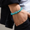 Men's minimalist turquoise beaded bracelet with turtle charm on a male wrist - Turquoise Green Turtle Style / Blue (02286)