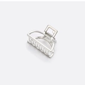 Close-up of a silver semi-circular alloy hair claw clip with a sleek metallic finish - Small Silver