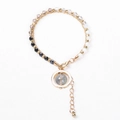 Detail of bohemian layered bracelet with colorful beads and golden ring stone pendant - Multicolor Beads with Round Stone Charm
