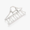 Detail view of large silver geometric metal hair claw clip with strong spring mechanism - Silver