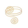 Detail of golden spiral arm cuff with hammered texture and bohemian scroll patterns - Textured Gold