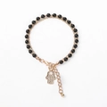 Detail of double-layer beaded bracelet with Hamsa Hand charm and sparkling crystals - Black Beads with Hamsa Hand