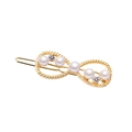 Elegant infinity-shaped gold bobby pin with white pearls and sparkling zircons - Infinity (H137)