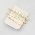Close-up of elegant gold hair clip set with pearls and geometric wave designs - Pearl Geometric Wave Combination (5)