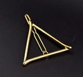 Minimalist gold triangle metal hair clip for women on elegant black matte background - Triangle Gold (H25)