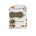 Vintage-Haarklammer-Set in Bronze mit Strass-Blättern und Sternen auf einer Blumenkarte - Schleife-Stil