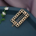 Elegant gold hollow chain rectangular hair clip on a blue tray with silk backdrop - Square / Gold