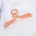 Dettaglio molletta per capelli in metallo oro rosa con design a onda e cuore - Oro rosa