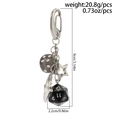 Hip hop style keychain with black D20 dice, translucent dice and silver star charms - Silver (00300)