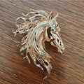 Creative horse head metal brooch in gold finish with textured mane for suits and coats - Gold