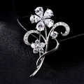 Elegant floral brooch with cubic zirconia crystals in silver finish on black background - Water Drop Flower