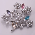 Detailed view of the multi-color crystal and pearl flower tree brooch with silver plating - Branch Pearl