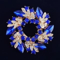 Élégante broche circulaire dorée avec des strass bleu foncé et des cristaux brillants - Boucle d'Écharpe Bleu Royal