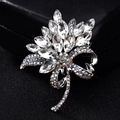 Elegant floral crystal brooch with silver metal base and shimmering AB rhinestones - White Orchid