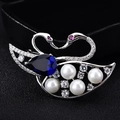 Elegante zilveren zwaan broche met grote peervormige blauwe edelsteen en parels - Zwaan Moeder en Baby