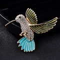 Goldene Kolibri-Brosche mit grünen Emaille-Flügeln und funkelnden Kristall-Strasssteinen - Emaille Kolibri